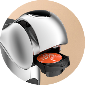 Dolce Gusto coffee pod in a machine